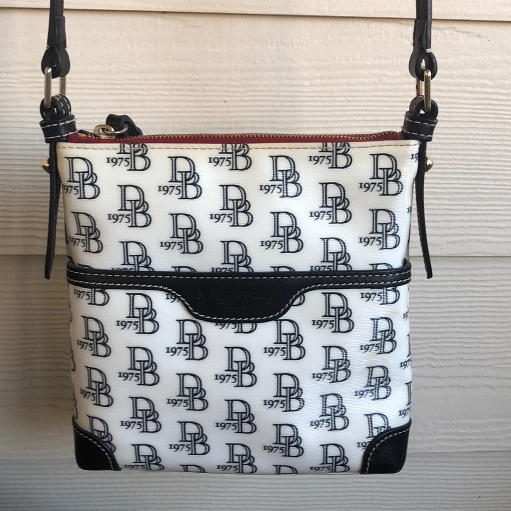 Black and white Dooney Bourke crossbody bag !